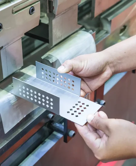 Worker at manufacture workshop operating cidan folding machine